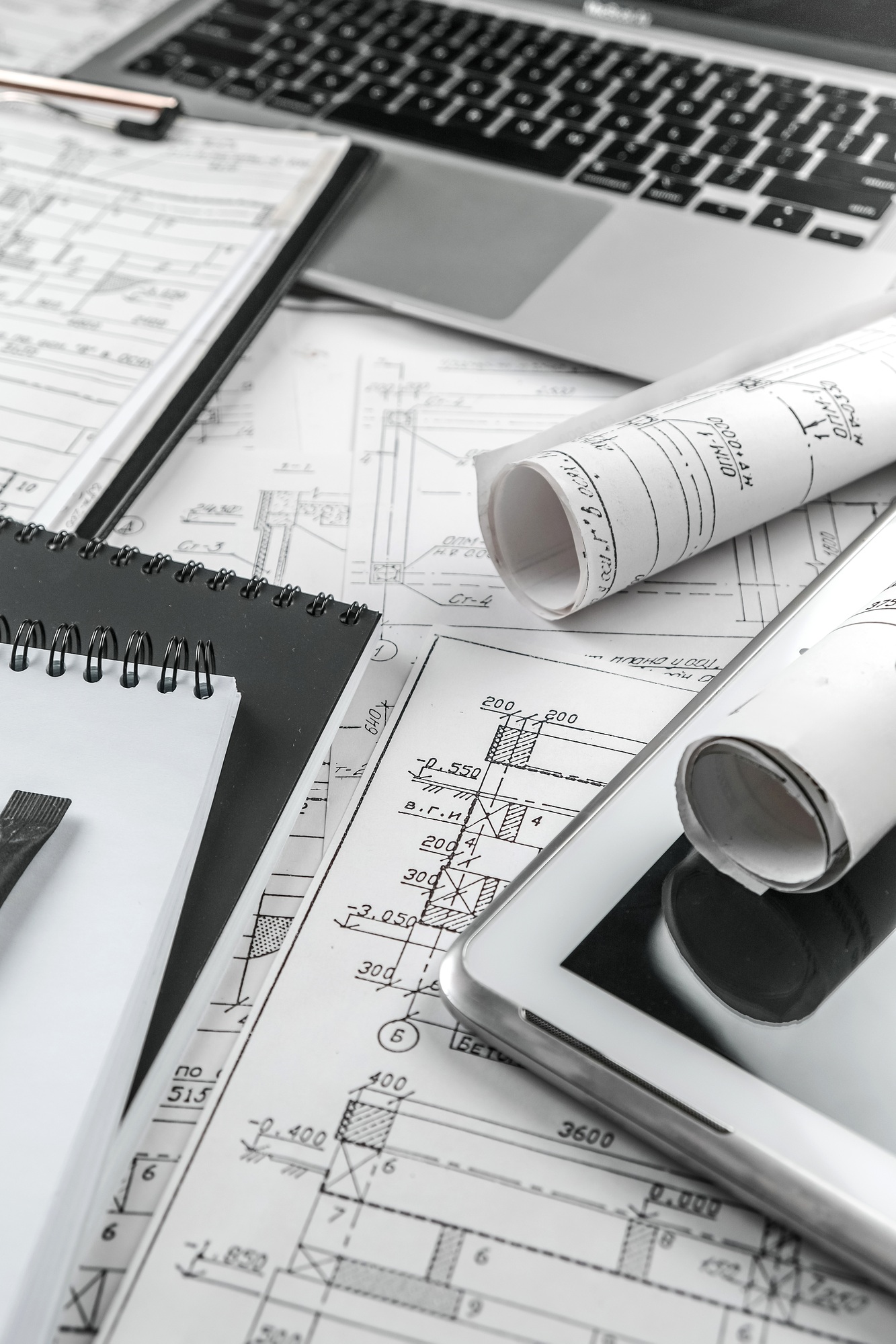 architect design working drawing sketch plans blueprints and making architectural construction model